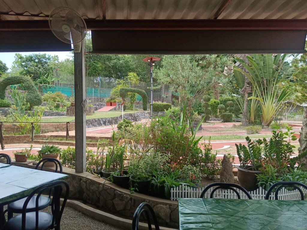 minigolf international koh samui shaded resting area to cool off and enjoy free soft drinks